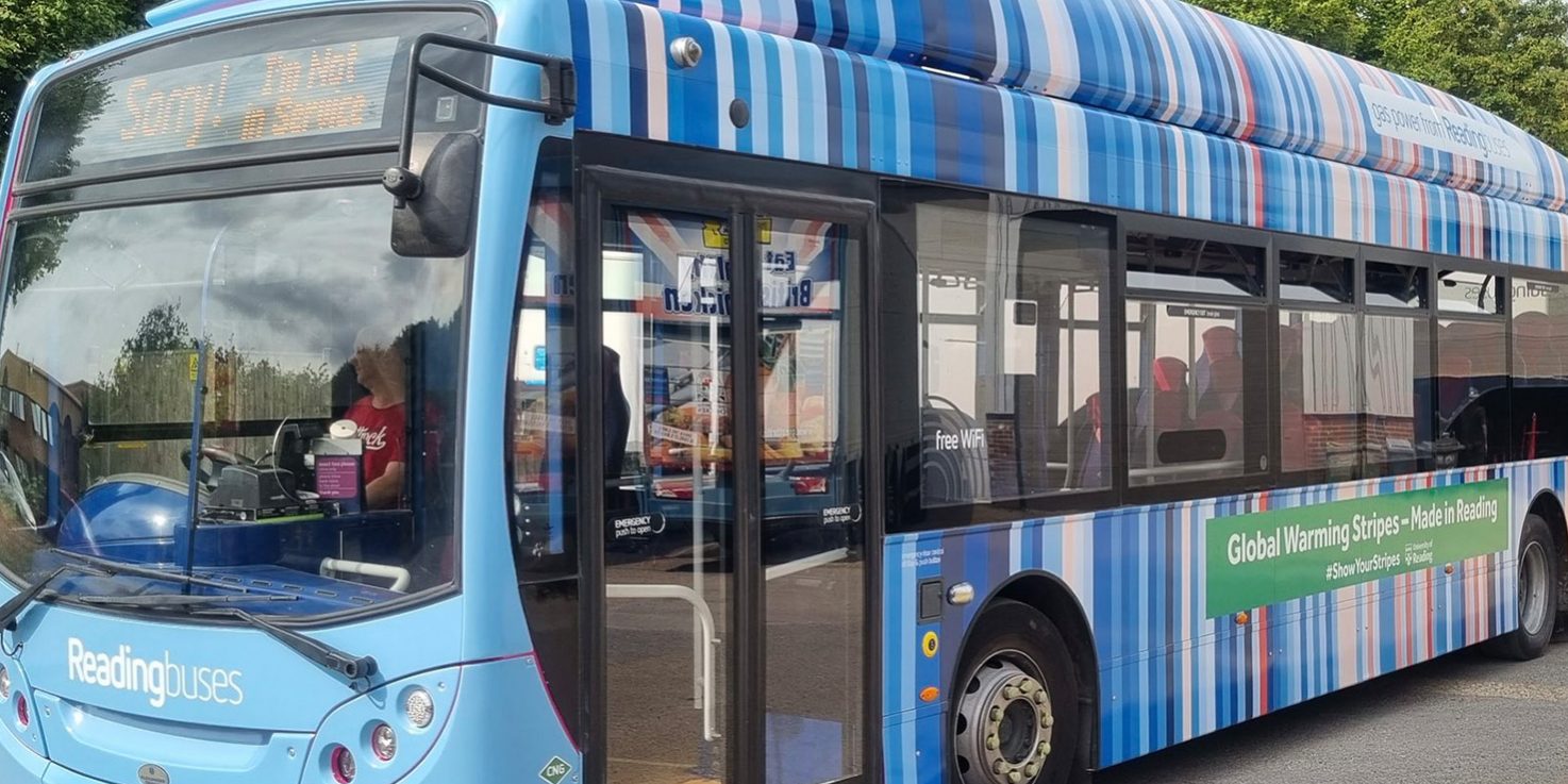 UK: Reading promotes sustainability with CNG bus with climate stripes pattern UK: Reading promotes sustainability with CNG bus with climate stripes pattern