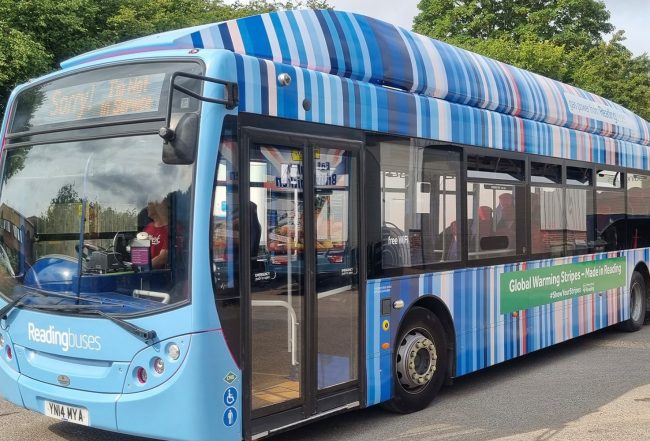 UK: Reading promotes sustainability with CNG bus with climate stripes pattern UK: Reading promotes sustainability with CNG bus with climate stripes pattern