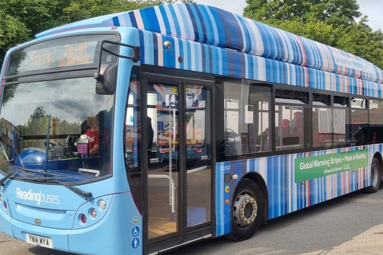 UK: Reading promotes sustainability with CNG bus with climate stripes pattern UK: Reading promotes sustainability with CNG bus with climate stripes pattern